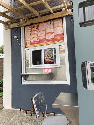 Walk-up window & outside table.