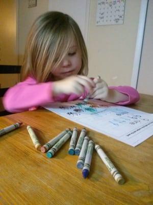 Doing her homework in the 3 year old room!