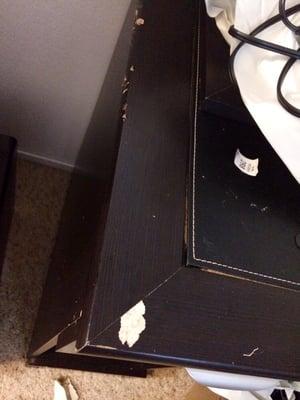 Chipped desk, stripped paint.. Just one of the damages