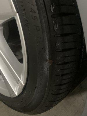 A nail sticking out of the side of my tire after getting my car from Classic Collision Sherman Oaks