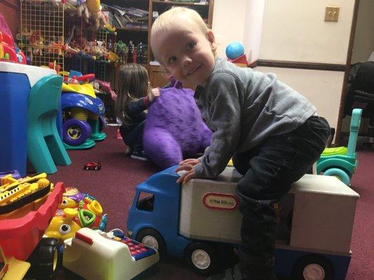 My two beautiful children, Frankie and Spencer, playing with toys at The Ness Counseling Center during a monitored visitation.