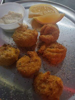 What's left of our delicious shrimp. These bang so hard. Love the breading. And the bar.