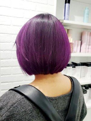 Bob cut with purple highlights and shadow roots