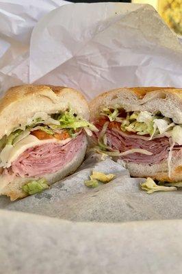 Italian Sub 14" ($13) ham, pepper ham, salami, cappicola, provolone. Meat sliced to order. Angelo makes the best hoagie in Jersey.