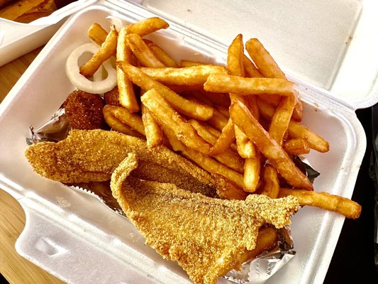 2 piece catfish comes with fries and a few small hushpuppies.