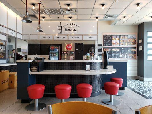 Menu, order station and counter seating