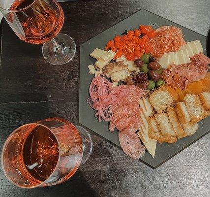 Full charcuterie board with rosé