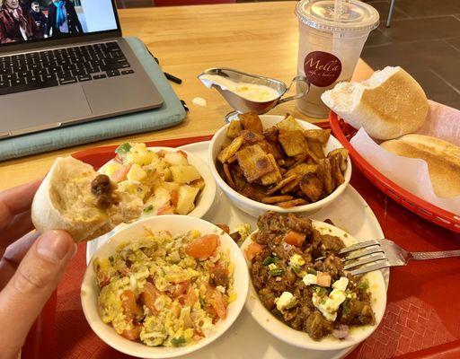 The breakfast combo...from the oven fresh french bread, spicy scrambed eggs, PERFECT fuul, potato salad and fried doughy things!