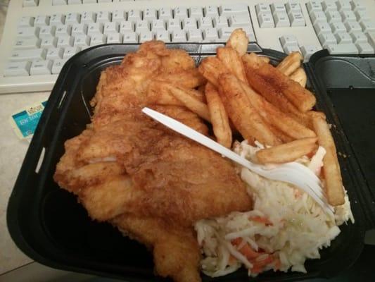 Fish fry with cajun fries and cole slaw