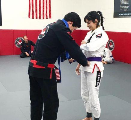 Receiving my belt from the master himself.