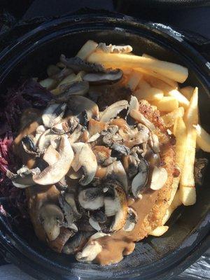 Jaegerschnitzel with pommes and red cabbage