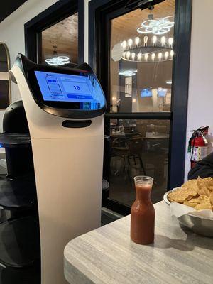 Robot delivering our chips and salsa.