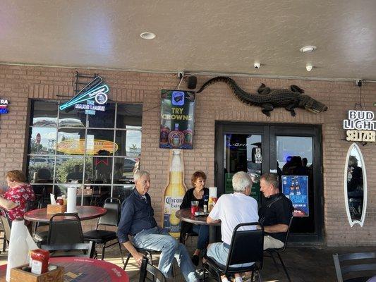 Outdoor dining. Standard tables as well as high top tables