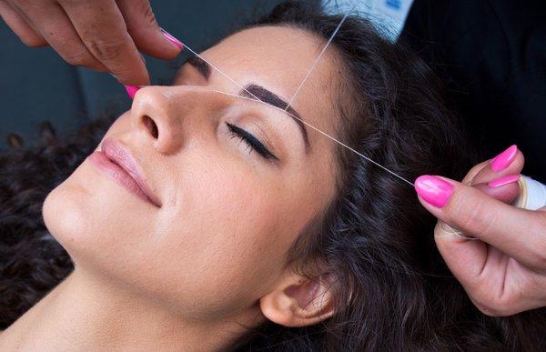 Eyebrow threading