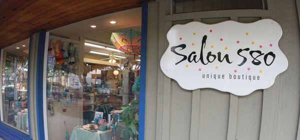 Salon 580 is located on the by the Donut shop on the corner or Grand and Roosevelt in Carlsbad, California.