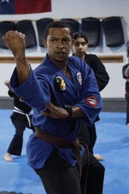 Coach Khris, Black Belt and Fighter, competitor