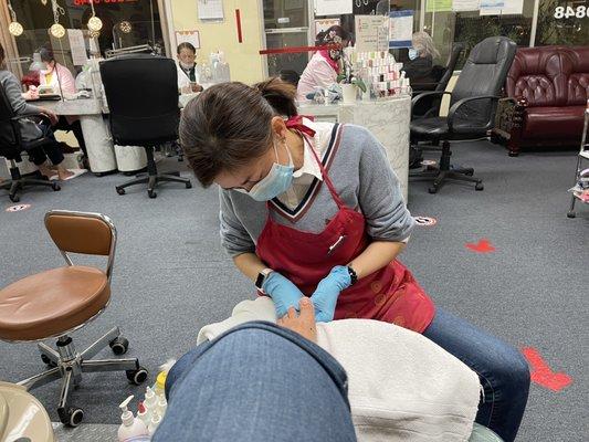 Pedicure in progress.