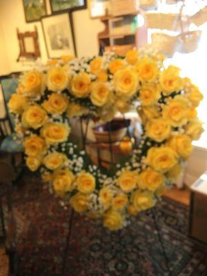 Heart shaped wreath of yellow roses