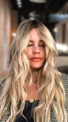 "Sparkle with Blonde Balayage! Butterfly Cut with Long layers & golden gloss for a radiant, sun-kissed look. Modern hairstyling