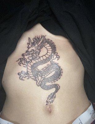 Dragon sternum tattoo done by Steve