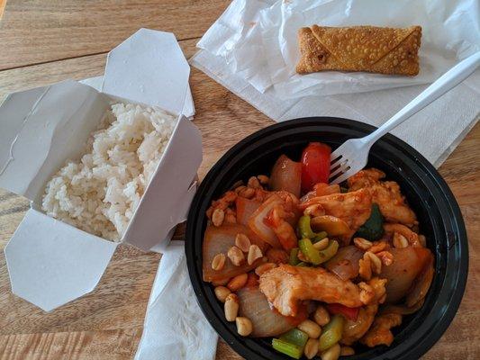 Large kung po chicken(comes with white rice) with a side of pork egg roll. Portions are much larger in person compared to this photo.