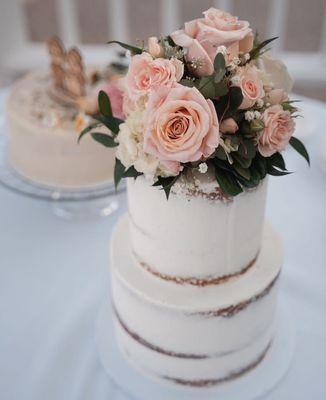 Razzleberry two-tiered cake with flowers