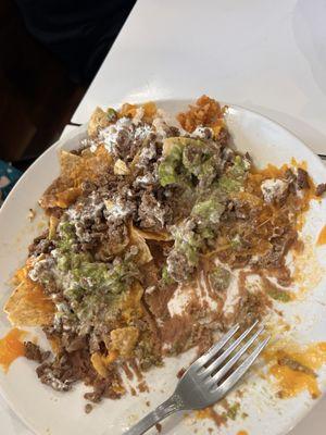 Asada nachos were so good! And a HUGE plate. Two of us ate from this and still had left overs.