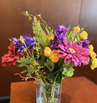 Flowers in the lounge on every table