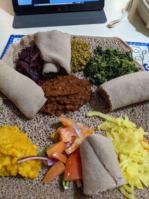 Veggie combo.  So tasty.  It's always fun to eat with your hands.  #ethiopianfood #injera