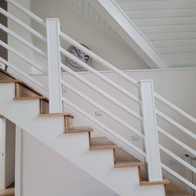 Open stairs we had custom ordered and installed by Completely Floored