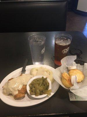 Fried chicken breast with sawmill gravy.