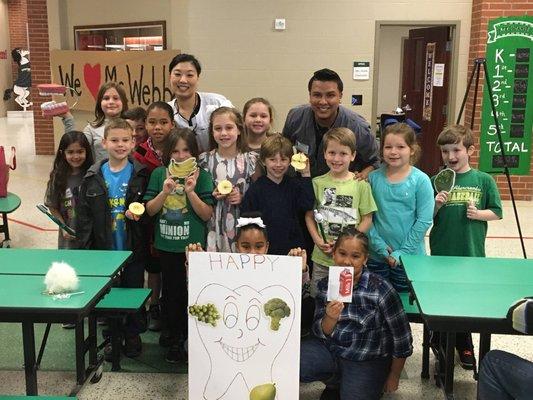 Dr. Suh and Daniel at Regina Howell Elementary for their annual Dental Health Month visit...