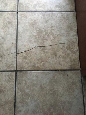 Tile in front of washer and dryer