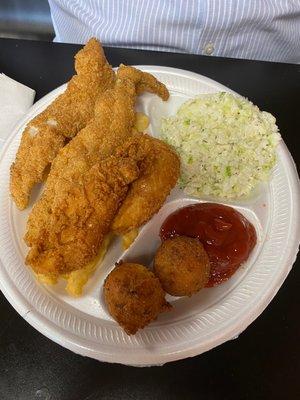 Fried catfish fillets, chicken tenders, coleslaw, fries and hush puppies