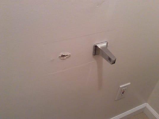 Only 4 months after the completion of our bathroom remodel the fixture has fallen off the wall!!