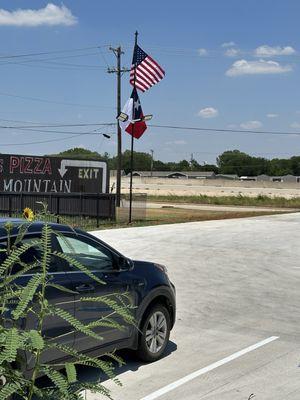 Outdoor sign and flags