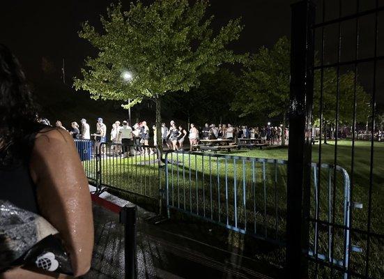 Only part of the line for the casino hotel shuttle. Note the foot of water Im standing in. People were holding their shoes