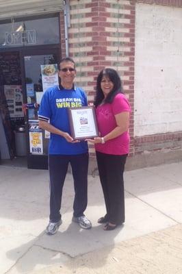 The owners (Keith and Anita) of Del Monte Market who won an award for outstanding costumer service!