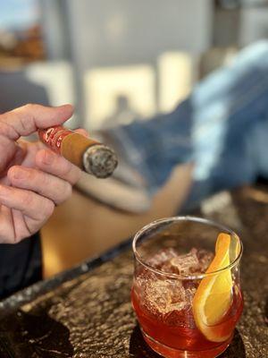 Old fashioned and a CT cigar.