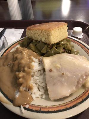 Turkey and dressing, rice and gravy, green beans, and ya gotta have cornbread!!!