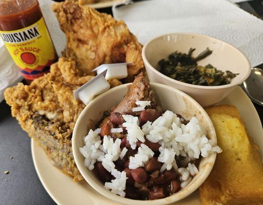 Fried chicken buffet with red beans and rice, greens and cornbread