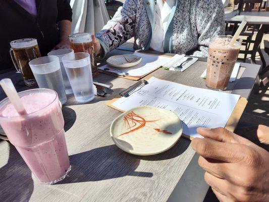 Strawberry boba shake and chocolate boba shake and beer