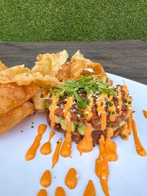 WONTON TUNA TOWER -
AHI TUNA POKE SOY SESAME GINGER SAUCE. AVOCADO.
SRIRACHA AIOLI, WONTON CHIPS