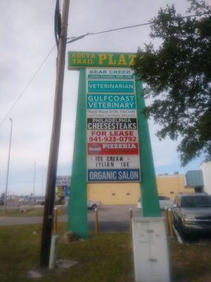 South Trail Plaza Road Sign shows Gulfcoast Veterinary, Dr Heidi Ward DACVIM, Oncology | Internal Medicine