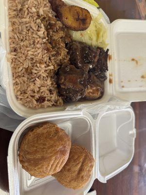 Brown stew chicken lunch and two fried dumplings 9$ for everything