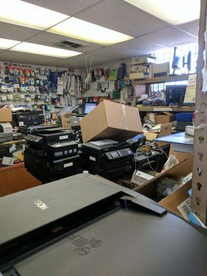 Just piles of printers in the front main room.