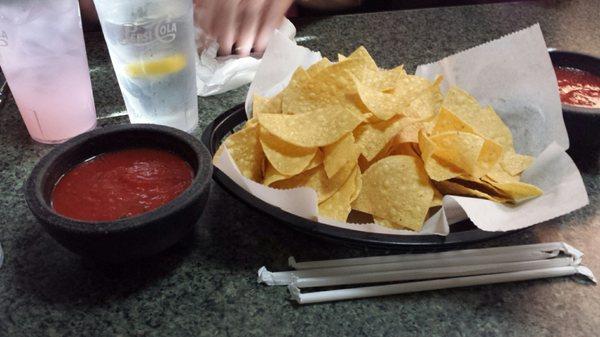 Light & thin tortilla chips with punchy salsa.