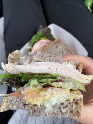 Turkey sandwich on olive walnut bread