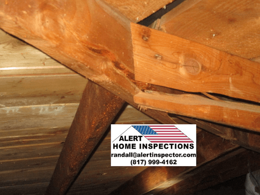 Cracked rafter in attic