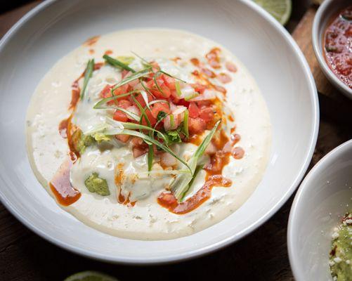 Austin Style Guacamole...The best of both worlds, guacamole + Tex Mex Queso and Cactus hot sauce.